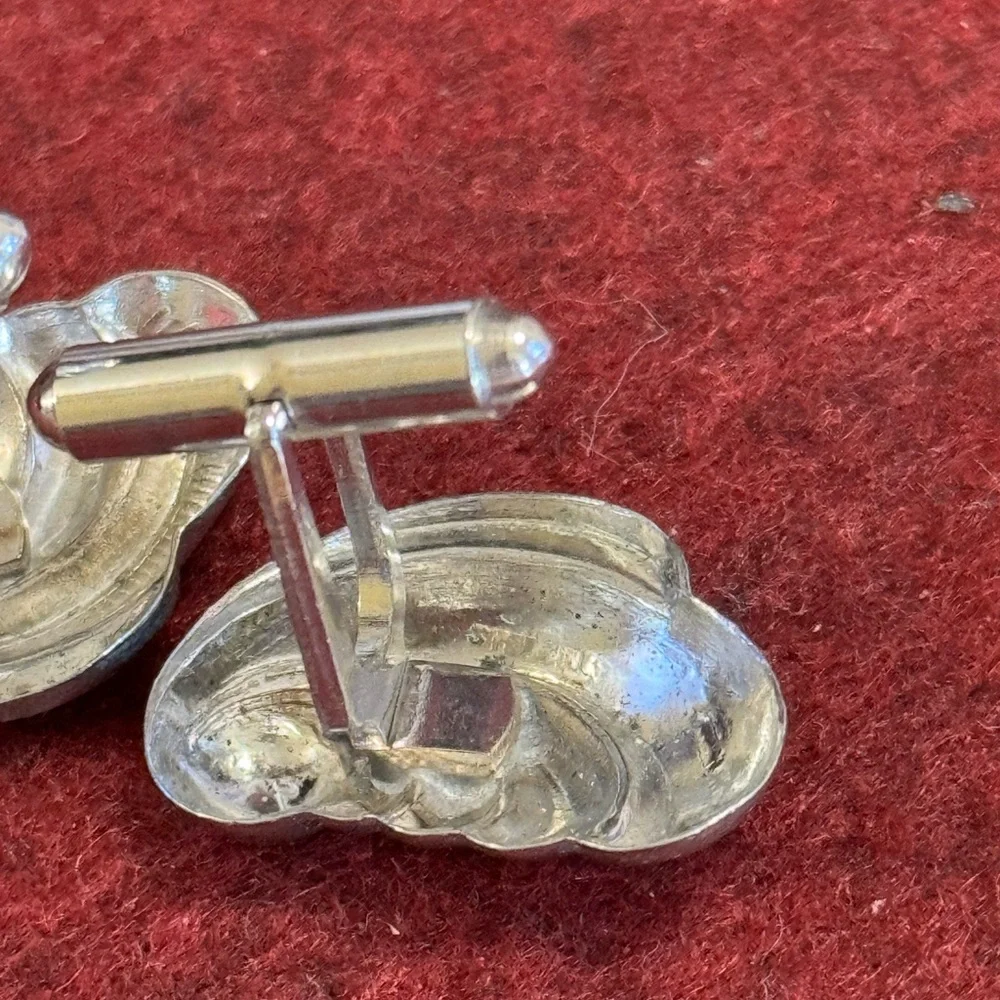 Men’s stamped sterling feather pillowy sea shell cufflinks